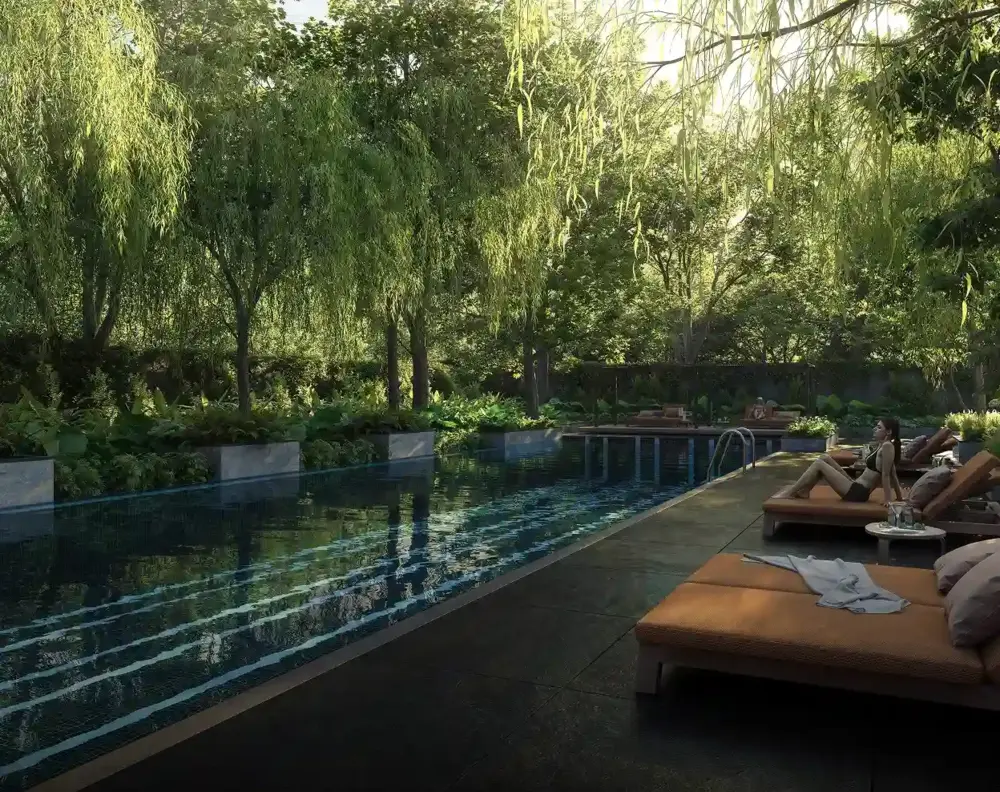 Single residential tower above a tree-lined street — Assetz Muse & Maison (6 of 6)