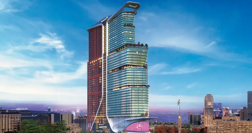 Office and residential towers at dusk — Brigade Gateway at Neopolis (3 of 4)