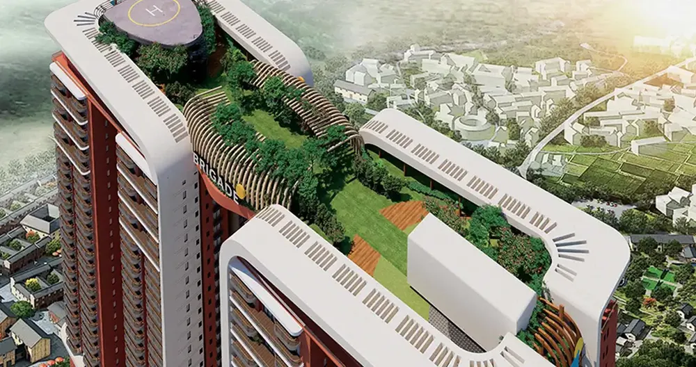 Office and residential towers at dusk — Brigade Gateway at Neopolis (4 of 4)