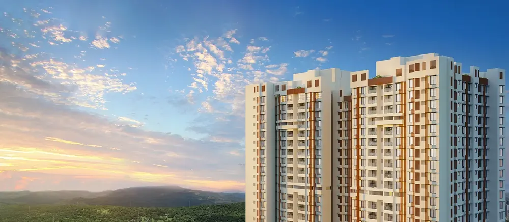 High-rise towers framed by trees at sunset — Godrej Bliss (2 of 6)