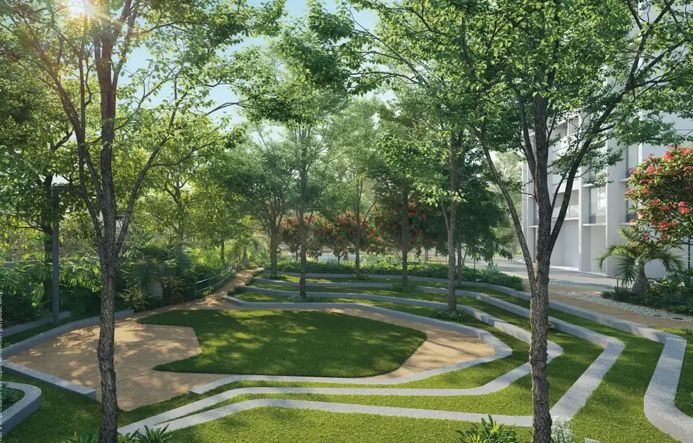 Three residential towers rising beside a city road — Godrej Nurture (6 of 6)