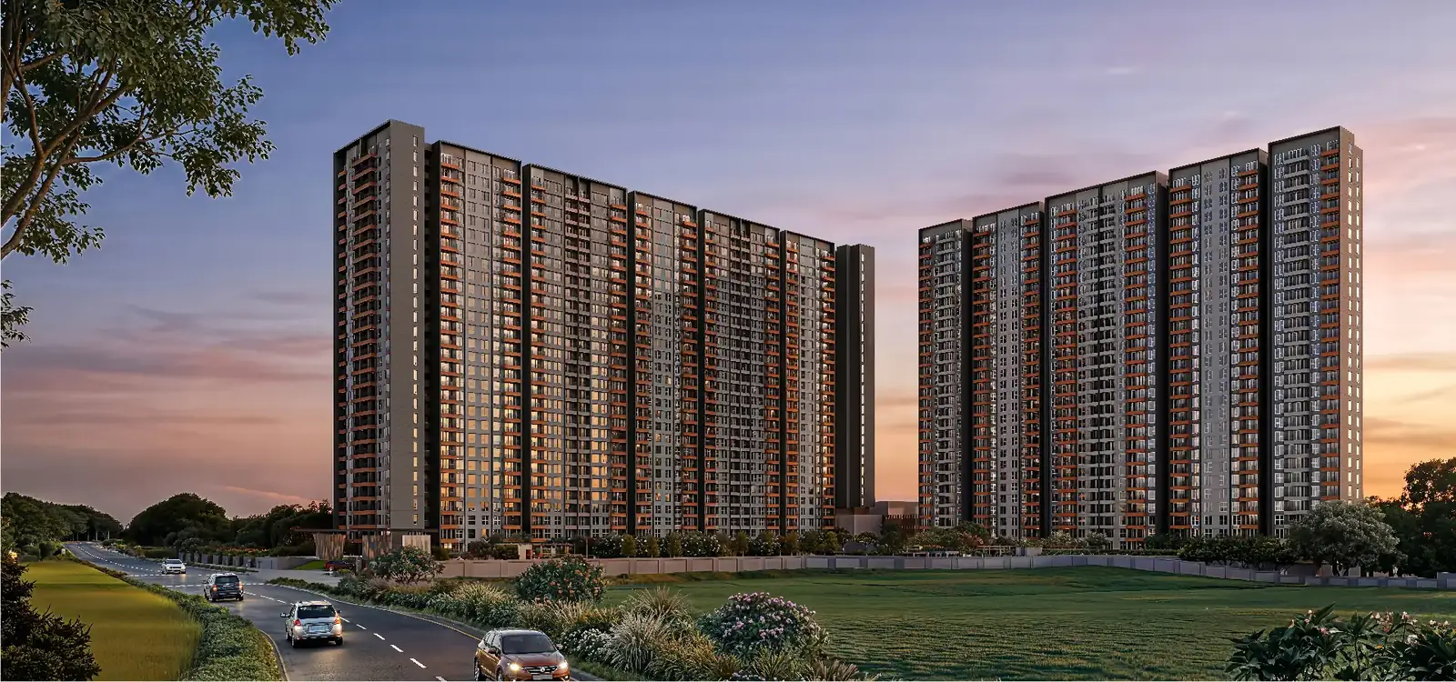 Two residential towers at dusk beside a landscaped road — Godrej Parkshire (1 of 6)