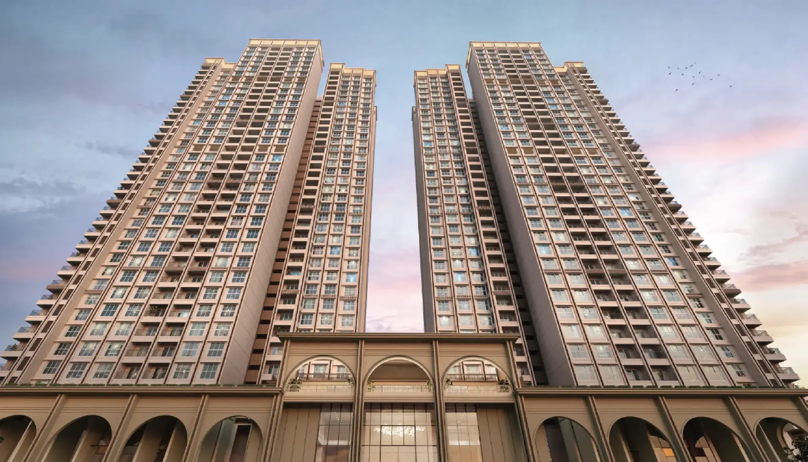 Twin residential towers rising above landscaped greens — Godrej Regent Park (1 of 6)