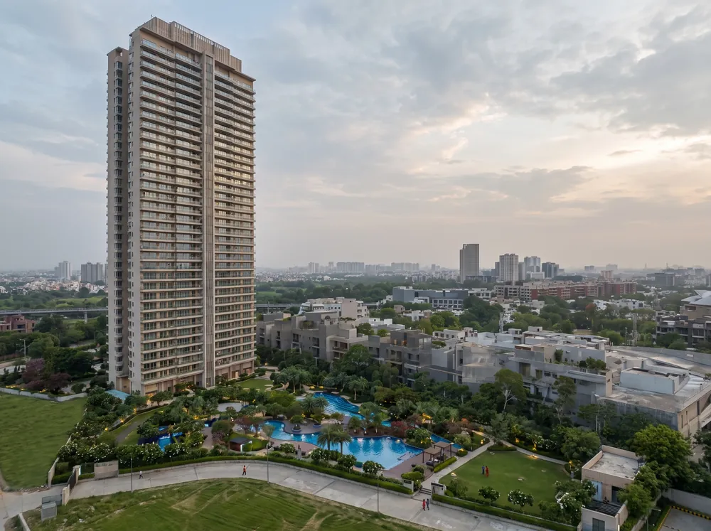 Dusk exterior with lagoon lawns — Godrej Riverine (2 of 5)