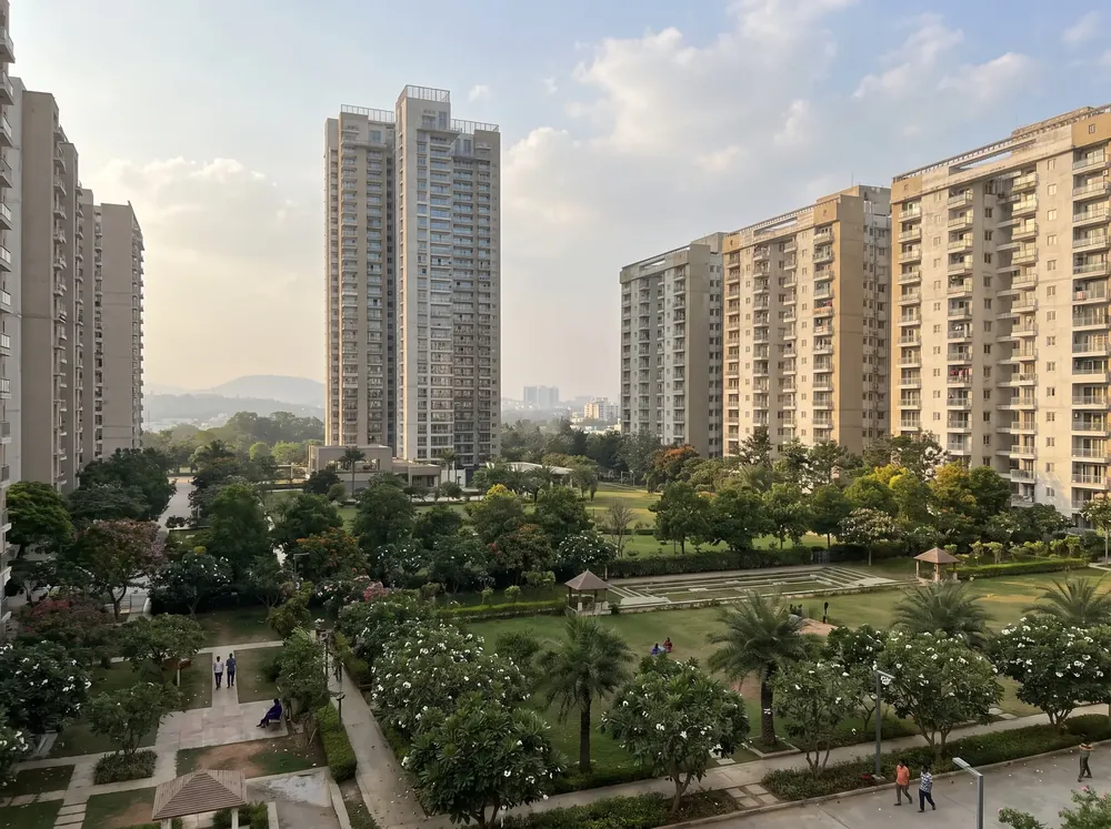 Forest-edged towers with mirror-water clubhouse — Godrej Vanantara (3 of 5)