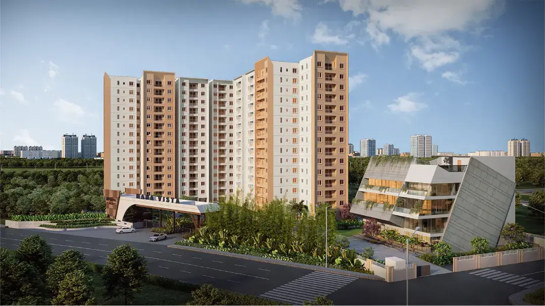 Towers and an angular clubhouse beside the entrance road — Mana Vista (1 of 6)
