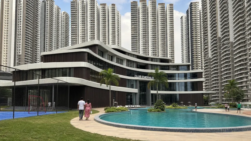 Township skyline over a forested park — Prestige Golden Grove (3 of 5)