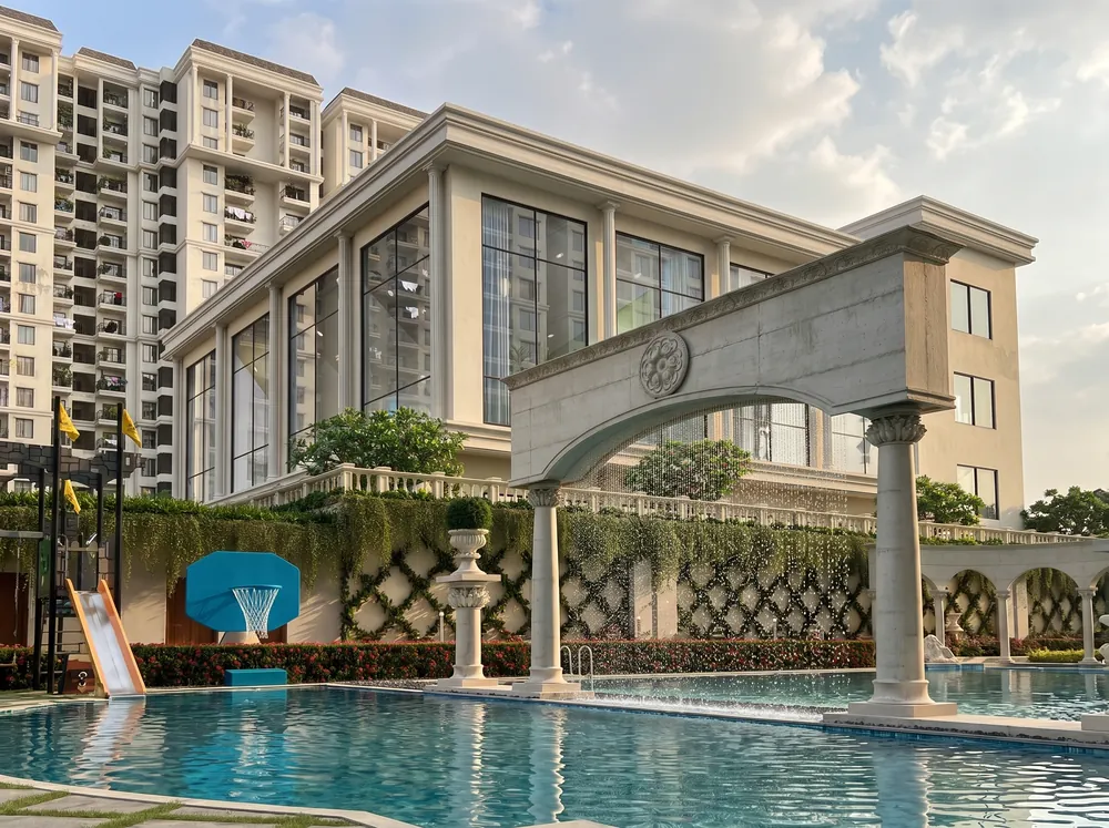 Manor-style towers over formal gardens — Sumadhura Edition (4 of 5)
